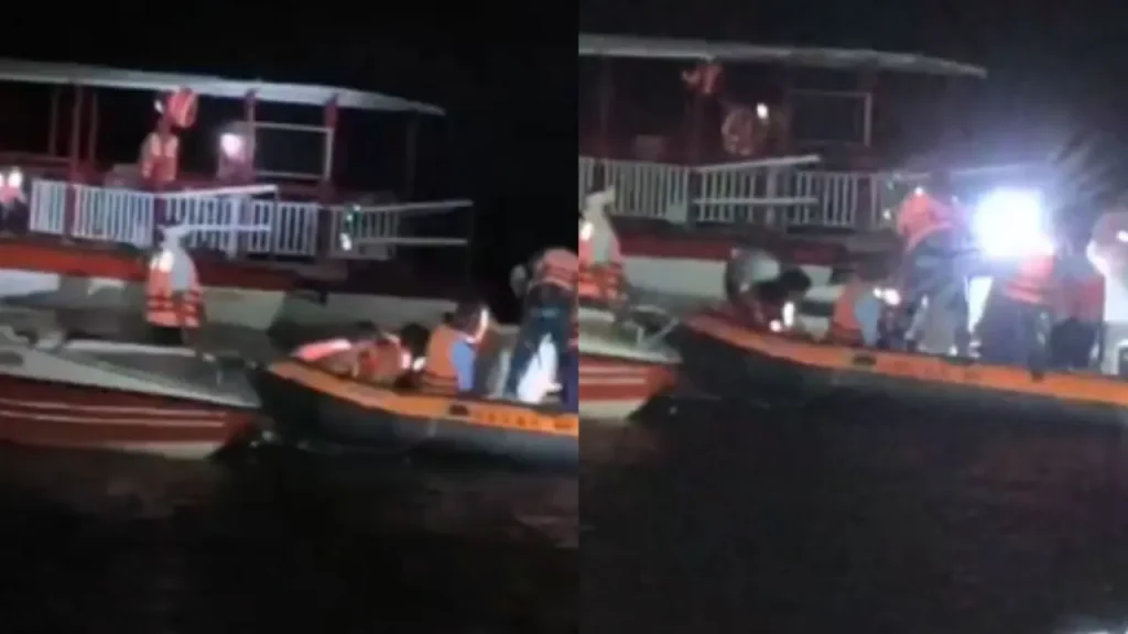 Rescue team carrying out late night rescue operation after the cruise ship sank in Bargi Dam.