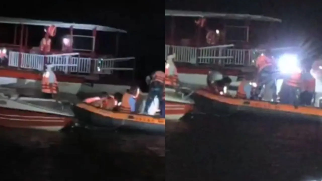 Rescue team carrying out late night rescue operation after the cruise ship sank in Bargi Dam.