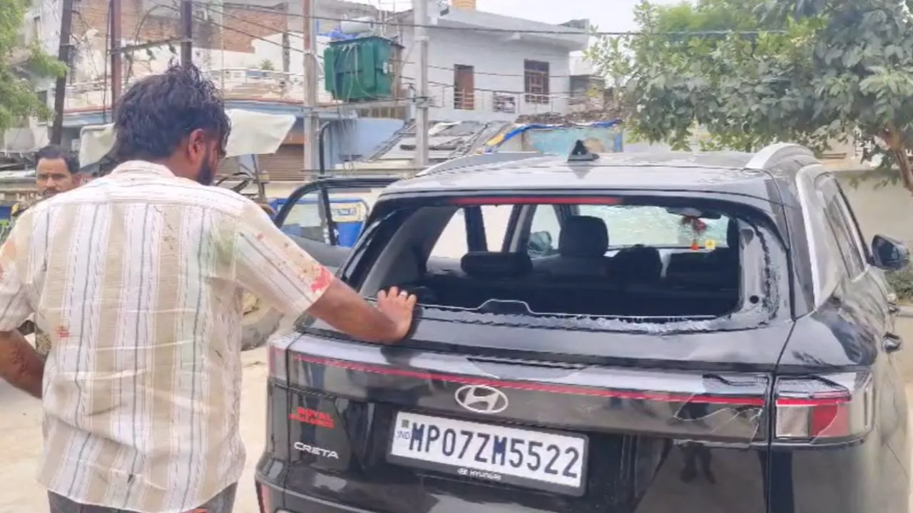 The car's windows were broken during the firing by the miscreants.